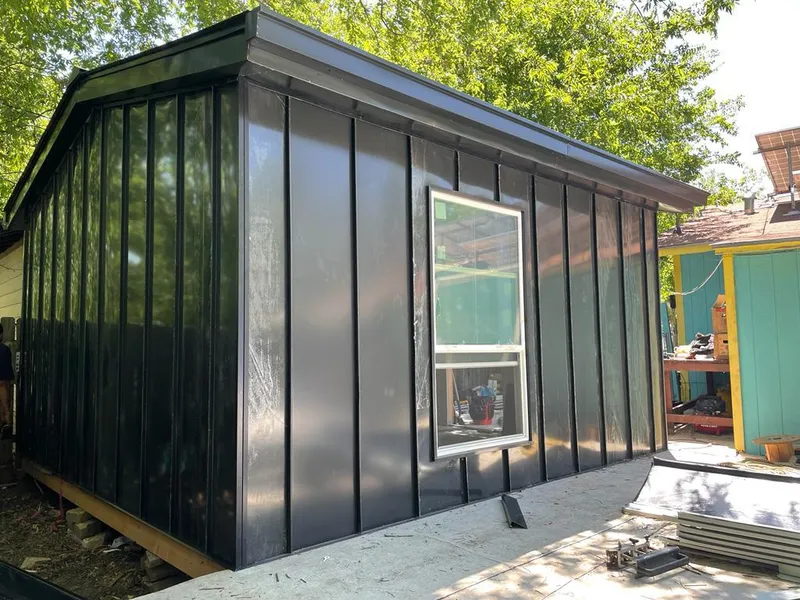 Black standing seam metal wall panels for Metal Roof Installation in Des Moines